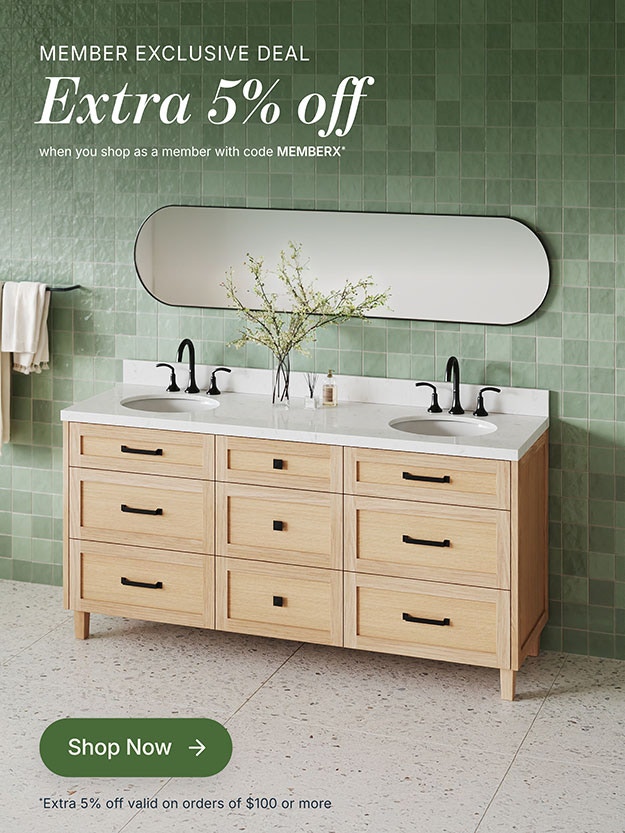Natural oak single sink vanity with shaker drawers, white countertop, and green tile wall background Natural oak single sink vanity with shaker drawers, white countertop, and green tile wall background